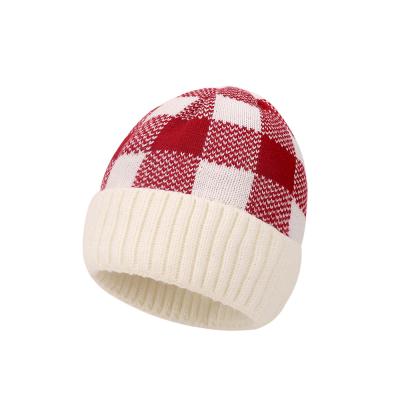 China Cozy new jacquard knitted children's hats 2021 new winter wool children's warm hats and stock hats for sale