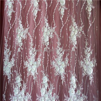 China 2020 Sustainable Material White Bridal Dress Embroidery Lace Fabric Wedding Tulle With 3D Flowers for sale