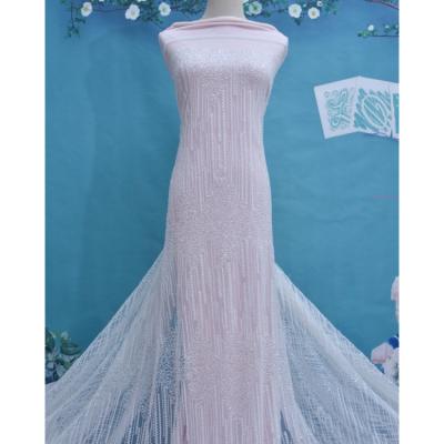 China 2020 anti-static nigerian lace wedding high quality bridal /handmade Tulle lace with beads /heavy lace for sale