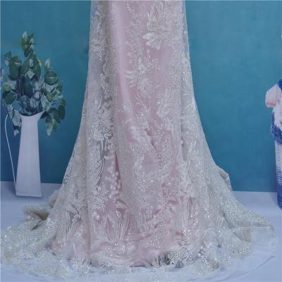 China 2020 Luxury Fabric Anti-static Sequins African Beads Lace Fabric High Quality Nigerian French Wedding Lace Fabric for sale