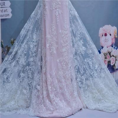 China Fashion Anti-Static Design Shiny Glitter Turkey Tulle Mesh Fabric With Beads For Wedding Party Dress for sale