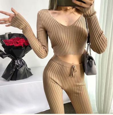 China Breathable Deep V Neck Off Shoulder High Elastic Sweater Top + Knitted Pants Two Piece Set for sale