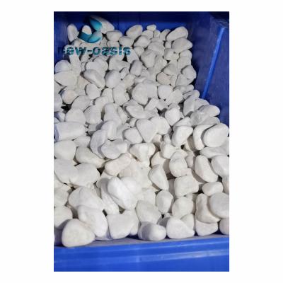 China Snow white natural pebble stone en venta