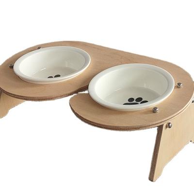 China Wholesale Sustainable Wooden Pet Cat Dog Ceramics Stainless Steel Sloped Elevated Drinking Bowl Feeding Bowl for sale