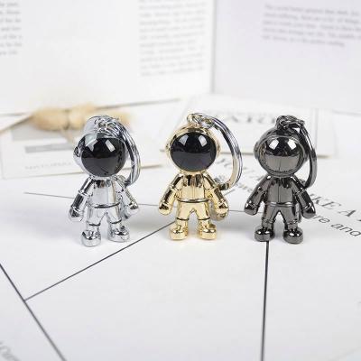 China New Handmade 3D Simulation Fashion Astronaut Space Robot Spaceman Key Chain Alloy Key Chain Gift For Man Friend for sale