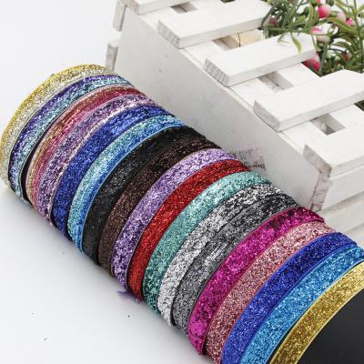 China Viable Hot Selling Non-elastic multi color magic color ribbon gold and silver onion velvet ribbon color sequin onion sash ribbon for sale