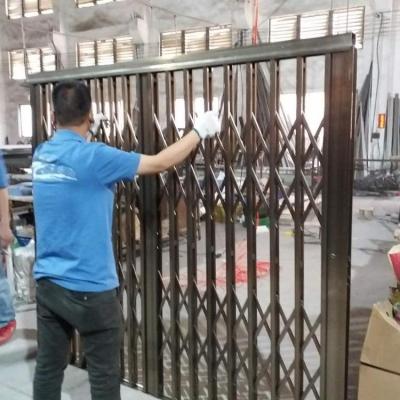 China Retrctable Anti-theft Security Grill Aluminum Sliding Door for sale