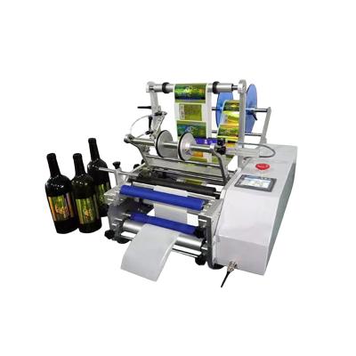 China Semi Automatic Food Competitive Price Labeling Machine For Round Plastic Bottle Sticking With Self Adhesive Label for sale