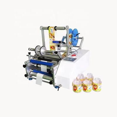 China Low Price Table Type Wine Semi Automatic Square Flat Surface Food Bottle Labeling Machine for sale