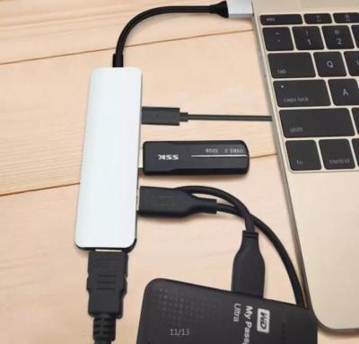 China Charging+Data Transfer High Quality 4 in 1 Type-C Hub Charging USB3.0 Adapter Hub USB Multiport Dock Station for sale