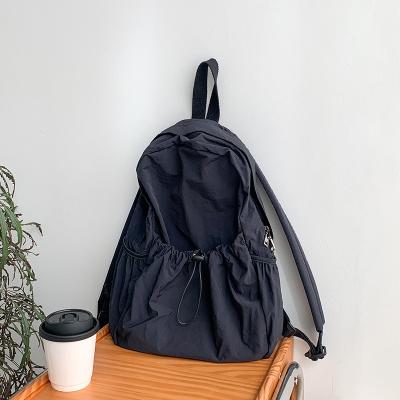 China Small quantities cheap waterproof wholesale office cotton seersucker raincoat backpack LOGO custom nylon backpack shopping foldable backpack for sale