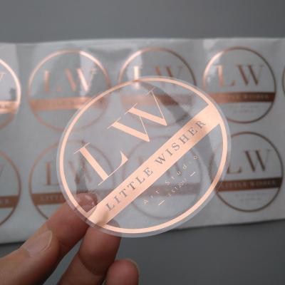 China Clear Rose Gold Foil Sticker Gold Stamping Logo Sticker Custom Waterproof Adhesive Label Sticker Clear PVC for sale