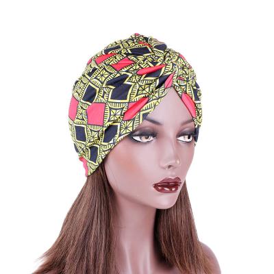 China New Ethnic Women's Cotton Turban Beanie Printing Twist Sleep Beanie Elastic Chemo Cap Hair Loss Hat for sale