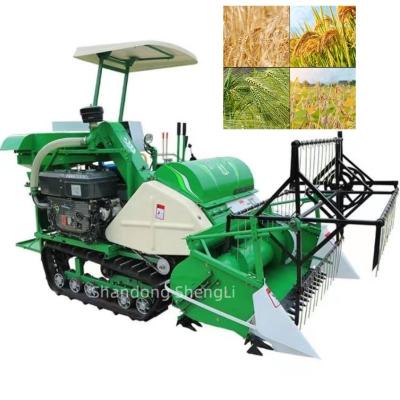 China Rice small multifunctional water field rice harvester is 25 hp full automatic rice grain crawler combine harvester for sale