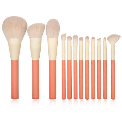 China Angular blush OCM 12pcs logo handle makeup professiona custom cute pink wood brush set for sale