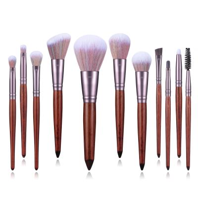 China Angular Blush OCM 11pcs Vegan Wholesale Professional Wood Handle Base Cosmetic Makeup Brush Set for sale