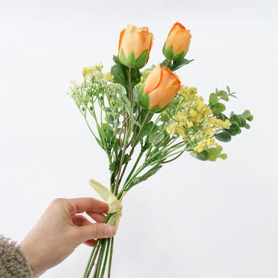 China Luxury Artificial Flower Lotus Gypsophila Eucalyptus Leaves Bouquet for Home Wedding Decor for sale