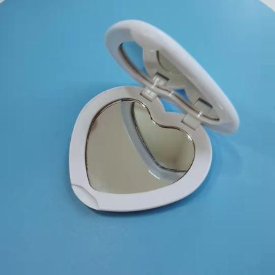 China Customized Folding Heart Shaped Recyclable Hands Beauty Travel Mirror Portable Cosmetic Mirror for sale