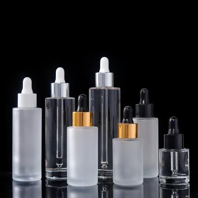 China Cosmetic Packaging 50ml Cosmetic Packaging White Black Lid Frosted Essential Oil Bottle With Dropper for sale