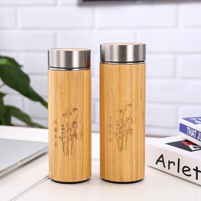 China Sustainable high quality 304 stainless steel laser cut stainless steel vacuum wooden bamboo water bottle for sale