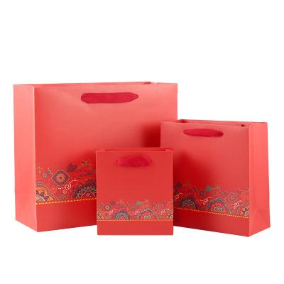 China Biodegradable Reusable Packaging Empty Box Tote Bag With Ribbon Red Kraft Paper Bag Packaging Paper Cardboard for sale