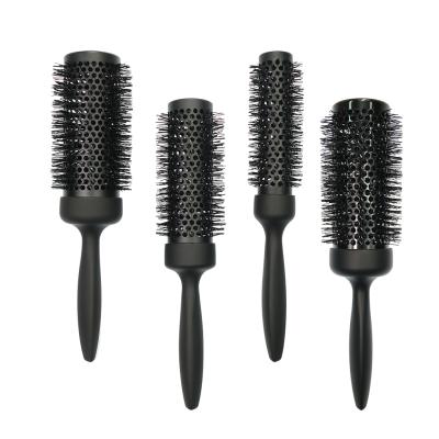 China Private Round Black Aluminum Ceramic Massage Tube Brush Hair Detangle Brush Pad Logo Thermal Brush for sale