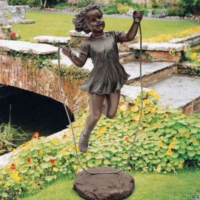 China Europe Metal Yard Statue Bronze Rope Girl Jumping Sculpture for sale