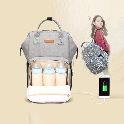 China Purpose 2019 Large Capacity Mummy Baby Diaper Backpack Multifunctional Waterproof Diaper Backpack Left USB Diaper Filler Bag for sale