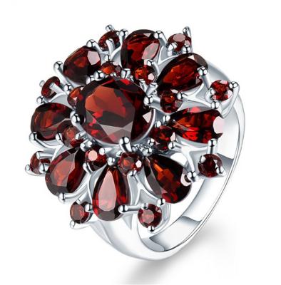 China Other Crystal Red Garnet Zircon Flower 2021 Form Stainless Steel Engagement Rings for sale