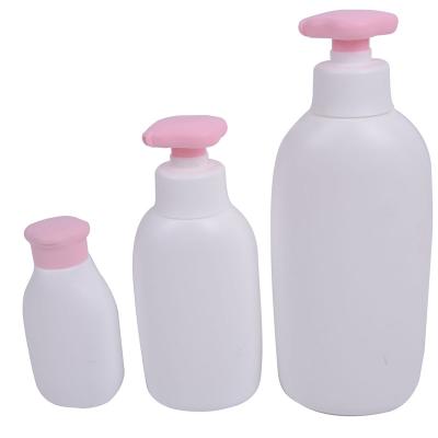 China Cosmetic The Empty Round Lotion Bottle Set Hair Conditioner Packaging Container Shampoo Bottle for sale