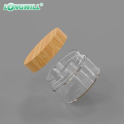 China Cosmetic Multi Size Logo Empty Premium Transparent Custom PET Plastic Jar Container With Wood Grain Bamboo Lid for sale