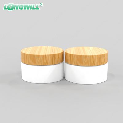 China One Stop Service Cosmetic Glass Jar And Bottles Custom Logo Container Multi Size Colorful Packaging With Bamboo Lid for sale