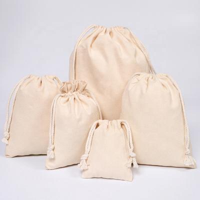 China Handled Plain Canvas Cotton Handbag Natural Color Drawstring Bag Cosmetic Drawstring Bag Gift Bag Sets for sale