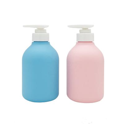 China Personal Care Plastic Lotion Bottle With Pump 400ml Round Wholesale HDPE Plastic Shampoo Bottle With White Pump In Stock for sale