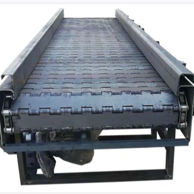 China 2400 Iron And Aluminum Scrap Iron Chain Plate Automatic Hinged Belt Chip Removal Machine Conveyor for sale