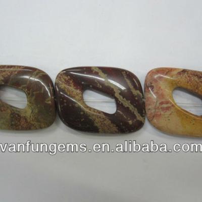 China Rainbow Stone Jasper Hallow Large Gemstone Donuts Beads for sale