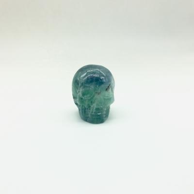 China Wholesale Natural Europe Gemstone Fluorite Hand Carved Skulls for sale