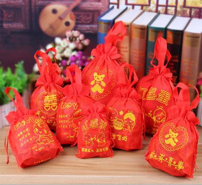 China Recyclable Hot Sale Red Velvet Bags Jewelry Packaging Bags Christmas Candy Wedding Gift Bags for sale