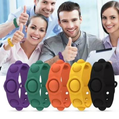 China Eco - Friendly Anti Stress Silicone Material Push Squishy Person Sensory Compression Wristband for sale