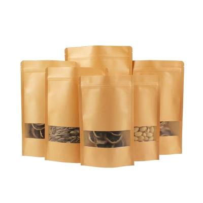 China Aseptic Wholesale Food Grade Packaging Stand Up Pouch Reusable Zip Seal Kraft Paper Bag With Clear Window for sale