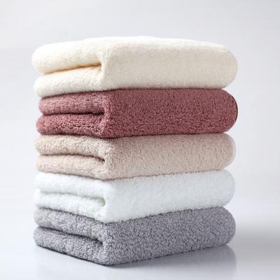 China Sustainable Designer Towels Face Towel Water Absorbent Super Soft Towel for sale