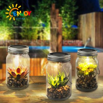 China Garden Lighting ENJOYSOLAR Mason Jar Garden Yard Table Light with Plants Outdoor Waterproof IP65 Solar LED Lights for sale