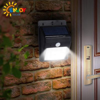 China Hot Selling Automatic On/off Switch ENJOYSOLAR Bright Light with PIR Motion Sensor Doorstep Garden Solar Yard Wall Light for sale