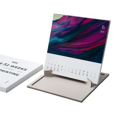 China Custom Unique Table Calendar Design Paper Printed Desk Calendar for 2023 for sale