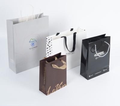 China Recyclable Wholesale Custom Logo Paper Shopping Bag With Cotton Handle Tote Bag for sale