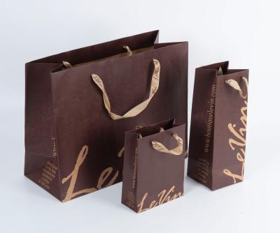 China Recyclable Custom Printed Brown Kraft Paper Shopping Bag With Handles for sale