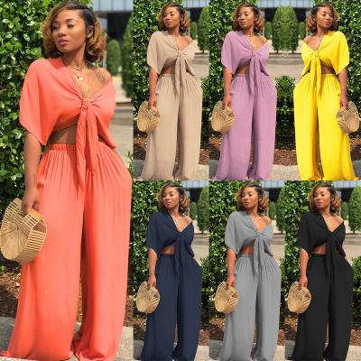 China Anti-Wrinkle Yard In Women Two-Piece Pants Set Ladies Workout Equipments Solid Color Bandage Crop Top Loose Wide Leg Pants Running for sale