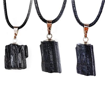 China China Wholesale Natural Black Raw Stone Pendant Irregular Electric Stone Column Stone for sale