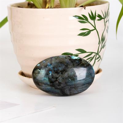 China China high quality natural hand cut blue labradorite palm flash stone for decoration for sale