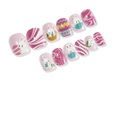 China Easy Apply Kids Nail Tips 24Pcs Kids Wholesale Lovely Short Fake Eggs Rabbit Girls Nails Press On Nails Full Cover Kids Nail Tips for sale